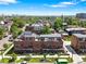 Aerial shot of a brick townhouse complex showcasing landscaping and surrounding neighborhood at 771 24Th St, Denver, CO 80205
