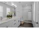 Modern bathroom featuring double sinks, a shower/tub combination, and contemporary fixtures at 771 24Th St, Denver, CO 80205
