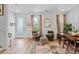 Inviting living room with hardwood floors, modern furnishings, and a bright open space to the dining area at 771 24Th St, Denver, CO 80205