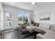 Airy living room featuring modern furnishings and bright natural light with city views at 771 24Th St, Denver, CO 80205