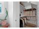 Spacious walk-in closet with ample shelving and hanging storage solutions at 771 24Th St, Denver, CO 80205