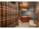 Basement bathroom with tiled floor and shower at 3891 Windchant Cir, Castle Rock, CO 80104