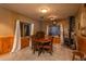 Cozy basement dining area with wood-burning stove at 3891 Windchant Cir, Castle Rock, CO 80104