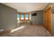 Bedroom with bay window, window seat, and wall-to-wall carpeting at 3891 Windchant Cir, Castle Rock, CO 80104