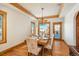 Formal dining room with hardwood floors and chandelier at 3891 Windchant Cir, Castle Rock, CO 80104