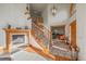 Grand entryway with curved staircase and tile flooring at 3891 Windchant Cir, Castle Rock, CO 80104