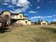 Beautiful two-story home with landscaping and attached garage at 3891 Windchant Cir, Castle Rock, CO 80104