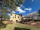 House exterior showcasing a deck and stone retaining wall at 3891 Windchant Cir, Castle Rock, CO 80104