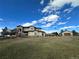 Two-story house with attached garage and landscaped yard at 3891 Windchant Cir, Castle Rock, CO 80104