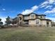 Two-story home with attached garage and beautiful lawn at 3891 Windchant Cir, Castle Rock, CO 80104