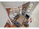 Living room with a stone fireplace and high ceilings, offering lots of natural light at 3891 Windchant Cir, Castle Rock, CO 80104