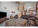 Bright living room with a high ceiling, large windows, and comfortable seating at 3891 Windchant Cir, Castle Rock, CO 80104