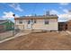 This home features a yard with a back entrance and ample space for outdoor activities at 8074 Grove St, Westminster, CO 80031