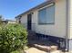 Charming home exterior featuring a tidy front yard, secure access, and lovely curb appeal at 8074 Grove St, Westminster, CO 80031