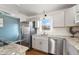 Well-equipped kitchen with stainless steel appliances, granite countertops, and ample cabinet space for storage at 8074 Grove St, Westminster, CO 80031