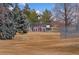 Fenced playground with climbing structures and a basketball hoop for recreation at 8074 Grove St, Westminster, CO 80031