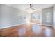 Bright, spacious bedroom with hardwood floors, large windows offering plenty of natural light, and a vaulted ceiling at 4225 W 30Th Ave, Denver, CO 80212