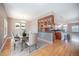 Inviting dining room with hardwood floors flowing into modern kitchen at 4225 W 30Th Ave, Denver, CO 80212
