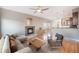 Inviting living room featuring a cozy fireplace and seamless flow into the modern kitchen at 4225 W 30Th Ave, Denver, CO 80212