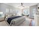 Serene main bedroom with vaulted ceilings, bright windows, and stylish decor at 4225 W 30Th Ave, Denver, CO 80212