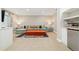 Finished basement with lounge area, built-in wet bar, and neutral decor at 4193 W 99Th Ct, Westminster, CO 80031