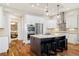 Bright kitchen with a large island, stainless steel appliances, granite countertops, and bar stool seating at 4193 W 99Th Ct, Westminster, CO 80031