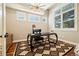Cozy office with modern desk, natural light, and hardwood floors, ideal for remote work at 4193 W 99Th Ct, Westminster, CO 80031