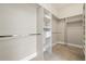 Well-organized walk-in closet with custom shelving and hanging rods, providing ample storage space at 4193 W 99Th Ct, Westminster, CO 80031