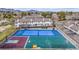 Aerial view of community showcasing outdoor sports court and beautiful scenery, with mountains in the distance at 5316 S Jellison St, Littleton, CO 80123