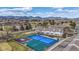 Aerial view of community showcasing outdoor sports court and beautiful scenery, with mountains in the distance at 5316 S Jellison St, Littleton, CO 80123