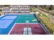 Aerial view of community sports courts including tennis, basketball, and hockey areas at 5316 S Jellison St, Littleton, CO 80123