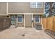 Enclosed patio area showcasing the AC unit and secure fencing, suitable for outdoor relaxation and privacy at 5316 S Jellison St, Littleton, CO 80123