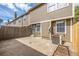 Backyard featuring patio, AC Unit, and wooden fence at 5316 S Jellison St, Littleton, CO 80123