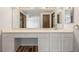 Bathroom features an extra-long vanity with ample counter space and storage at 5316 S Jellison St, Littleton, CO 80123