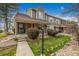 Charming townhome with well-maintained front yard and welcoming covered entryway at 5316 S Jellison St, Littleton, CO 80123