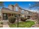 Charming townhome with well-maintained front yard and welcoming covered entryway at 5316 S Jellison St, Littleton, CO 80123
