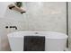 Elegant freestanding bathtub in a contemporary bathroom at 1260 Adams St, Denver, CO 80206