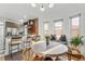 Modern kitchen with stainless steel appliances and exposed brick wall at 1260 Adams St, Denver, CO 80206