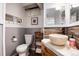 Charming bathroom with stone sink and backsplash, warm lighting, and traditional fixtures at 4545 S Lipan Ct, Englewood, CO 80110