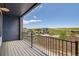 A cozy balcony with a view of the neighborhood and rolling green hills at 8321 Mount Kataka St, Littleton, CO 80125