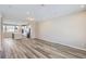 Spacious living area features hardwood floors, neutral walls, and a well-lit open layout at 8321 Mount Kataka St, Littleton, CO 80125