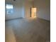 Spacious carpeted bedroom with ample natural light from a large window at 5626 W 142Nd Ave, Broomfield, CO 80020