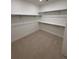 Walk-in closet with built-in shelving, providing plenty of storage space at 5626 W 142Nd Ave, Broomfield, CO 80020