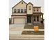Charming two-story home with a two-car garage and manicured front lawn at 5626 W 142Nd Ave, Broomfield, CO 80020
