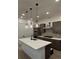 Kitchen with a large island, modern appliances, and recessed lighting at 5626 W 142Nd Ave, Broomfield, CO 80020