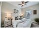 Cozy bedroom with neutral tones, a comfortable bed, and natural light from the window at 3956 Kalamath St, Denver, CO 80211