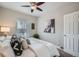 Serene bedroom featuring a plush bed with decorative pillows and a cozy, inviting atmosphere at 3956 Kalamath St, Denver, CO 80211