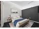 Comfortable bedroom with chic decor, soft bedding, and ambient lighting at 891 14Th St # 2105, Denver, CO 80202