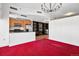 Open living area flowing into kitchen, complete with modern lighting and finishes at 891 14Th St # 2105, Denver, CO 80202