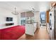 Open living room flowing into the kitchen with expansive city views and natural light at 891 14Th St # 2105, Denver, CO 80202